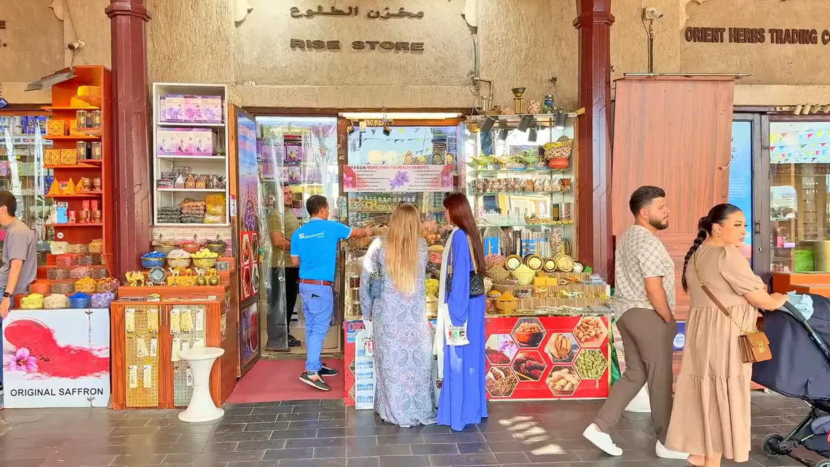 Women buying things from Spice Shop